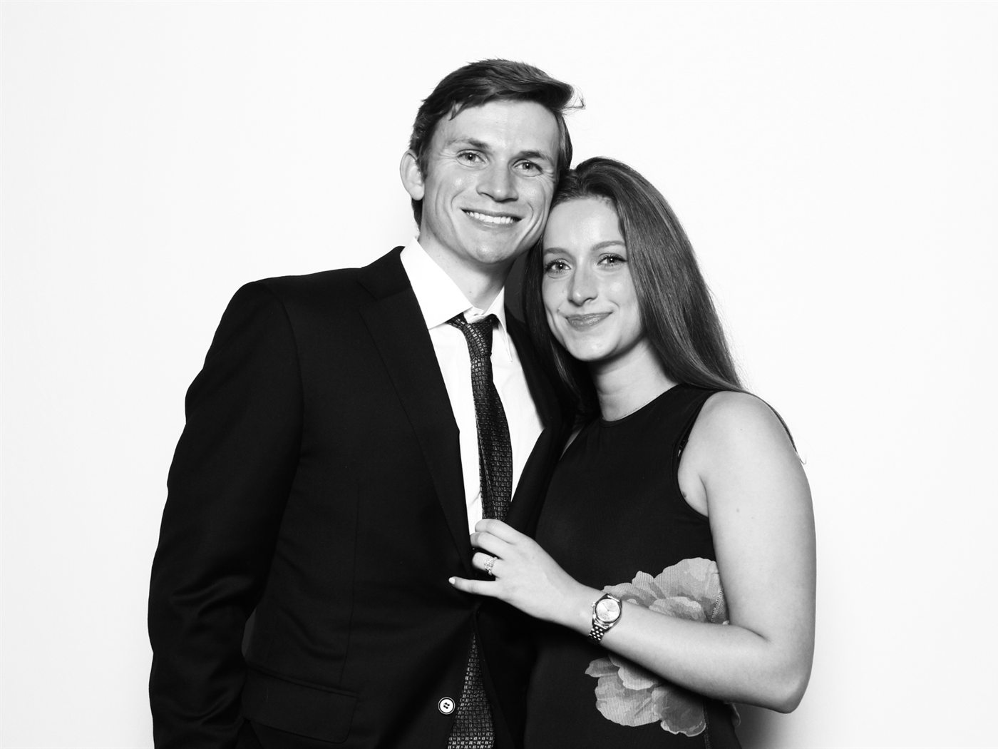The Dalthera founders, a black-and-white portrait of the two of them dressed up and smiling