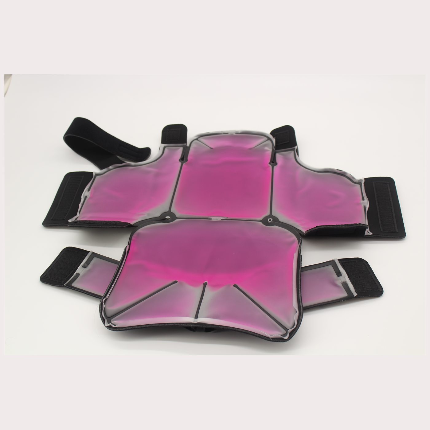 A cold cap opened out flat, showing its cooling panels